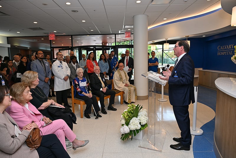 Jeffrey Menkes addresses crowd at Calvary Hospital’s newly renovated Family Care Center and lobby.